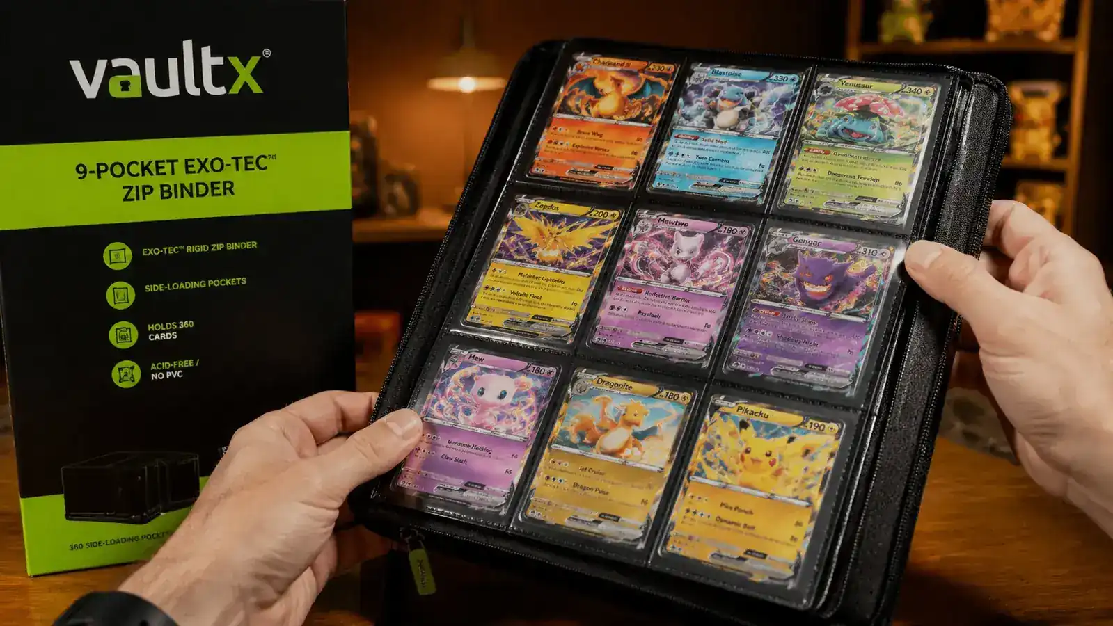 Close-up of side-loading binder page holding Pokemon cards with none slipping out at the bottom